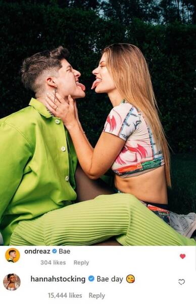 Hannah Stocking and Ondreaz Lopez sticking their tongues out looking at each other.